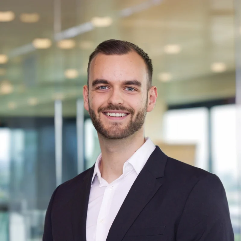 Typical pro photoshoot output — stiff, LinkedIn-style